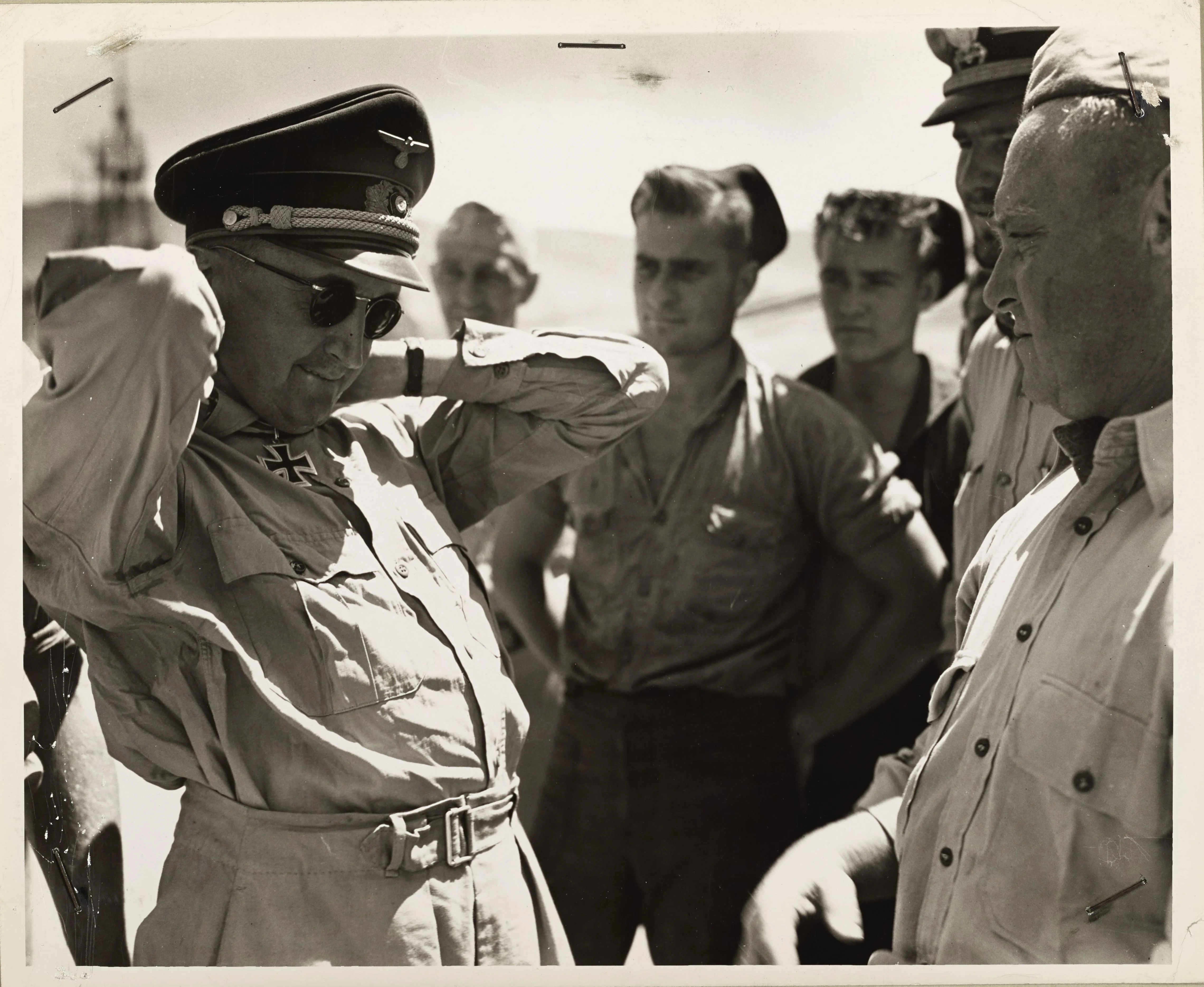 German Officer Surrenders Iron Cross in North Africa, 1943